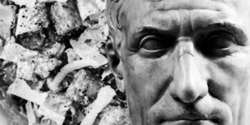 Julius Caesar bust next to a bowl of Caesar salad with text CAESAR HATED SALAD