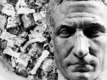 Julius Caesar bust next to a bowl of Caesar salad with text CAESAR HATED SALAD